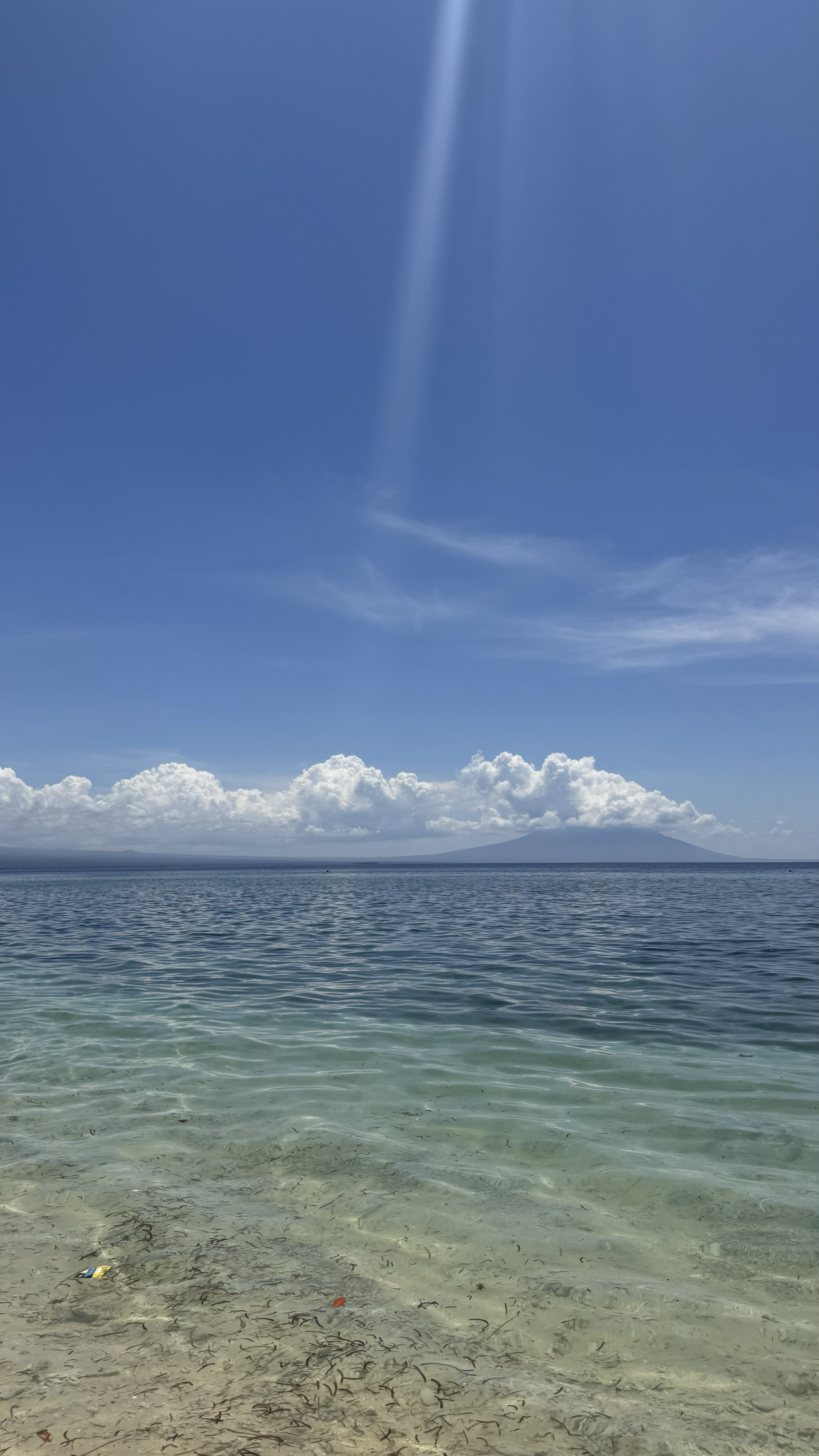 white sand blue water